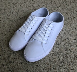 asos design sneakers in white canvas