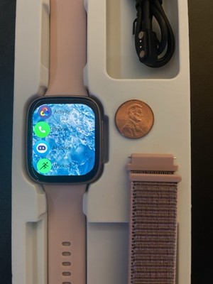 GTX20 Smart Watch with Pink Silicone Band & Extra Band, 56mm. Brand new/Tested