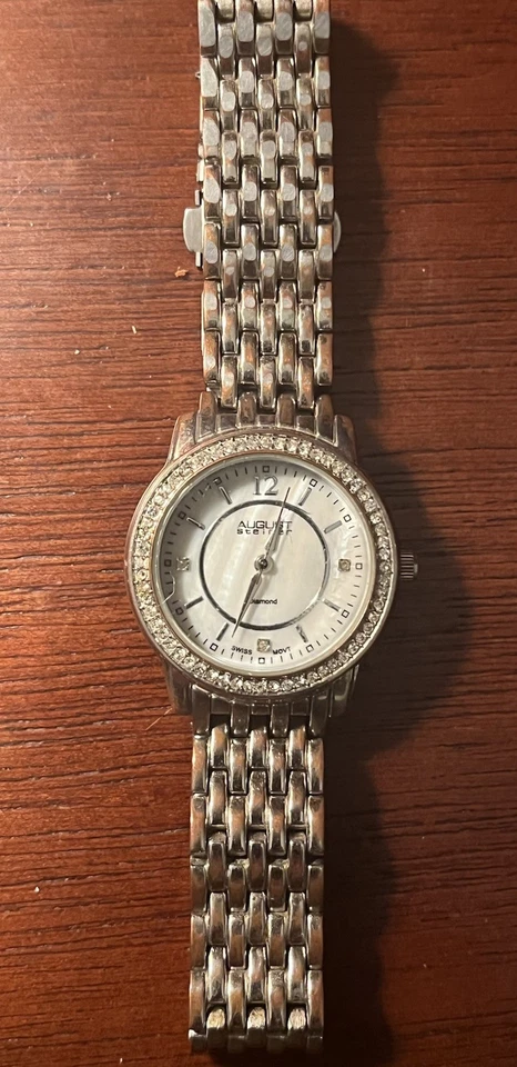 RELOJ DE CUARZO CON CLASE AUGUST STEINER MOVIMIENTO SUIZO CON FREGONA Y PULSERA DE PLATA Foto 2 de 4