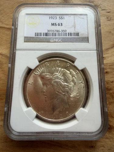 1923 SILVER PEACE  Dollar MS63 NGC Graded Brown Label
