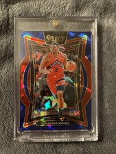 2024-25 Panini Select Jonathan Mogbo Rookie Blue Prizm #87 Toronto Raptors NBA