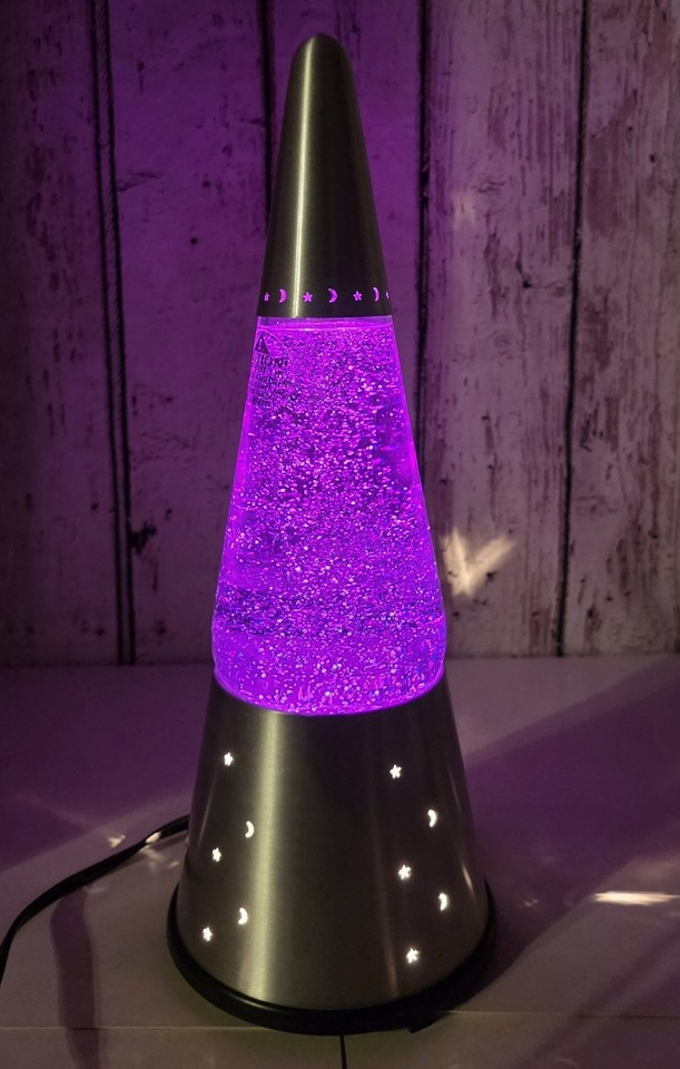The original 16" Lava Lite Wizard #33W with silver base and purple glitter liquid — a named, numbered vintage rarity that's basically a collectible artifact.