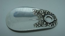 ANTIQUE SILVER PLATE REPOUSSE FLOWERS 2 5/8 SHOE HORN