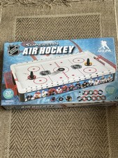 NHL Superstar Core Series Mini Tabletop Air Hockey Table.