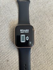 Apple Watch Series SE 44 mm Gold Aluminum Case Black Silicone Band 32GB gps