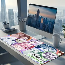 A Large Electronic Sports Gaming Mouse Pad Featuring a Collage Design of a Pin