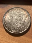 1884 O Morgan Dollar BU Toned - As Shown (#510)