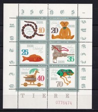 Mały łuk NRD "Zabawki - Zwierzęta" - czysty - lewy nie ząbkowany!