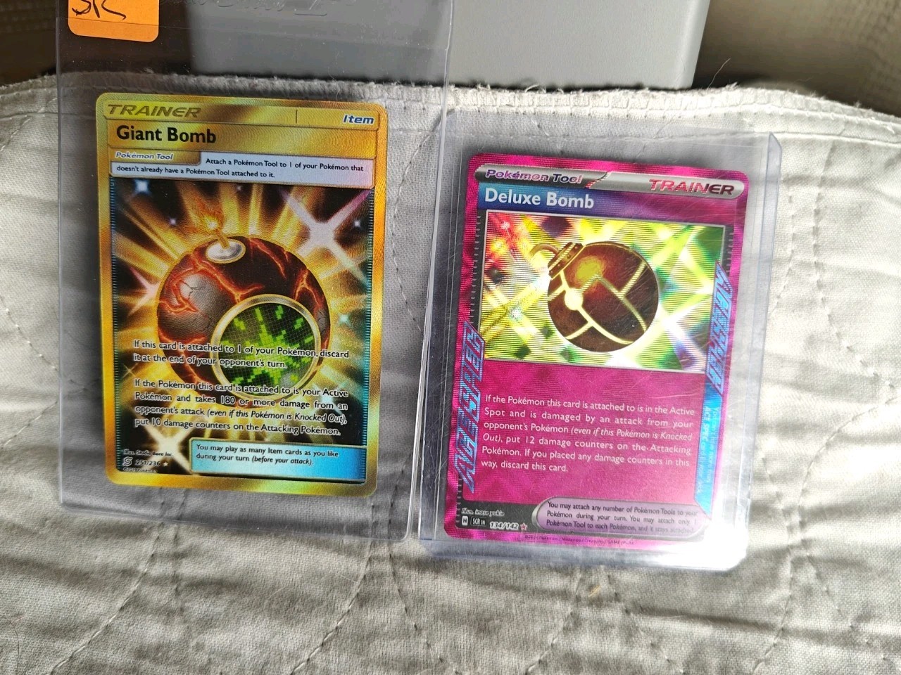 Pokemon - Giant + Deluxe Bomb 134/142 -251/236 - Secret Rare Unified Minds - LP 