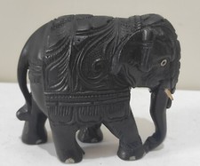 🍀 Éléphant en bois d'ébène