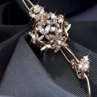 18k yellow gold made with Swarovski crystal flower fireworks hair clip barrette