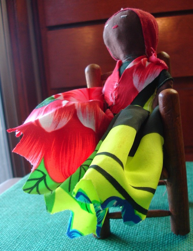 Handmade Primitive Black Cloth Doll in Wd Chair Colorful Dress Bandanna Folk Art
