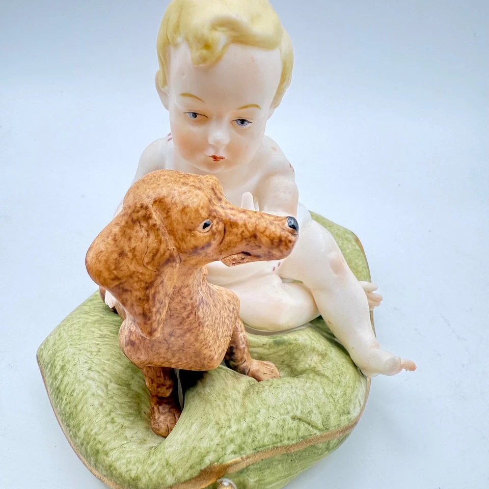 Estatuilla de porcelana vintage bebé dachshund perro jugando almohada hecha en Japón MORRA Foto 3 de 4