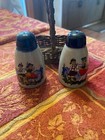 Vintage Ceramic Salt and Pepper Shakers - Alpine Boy & Girl - Wicker Basket — photo 2