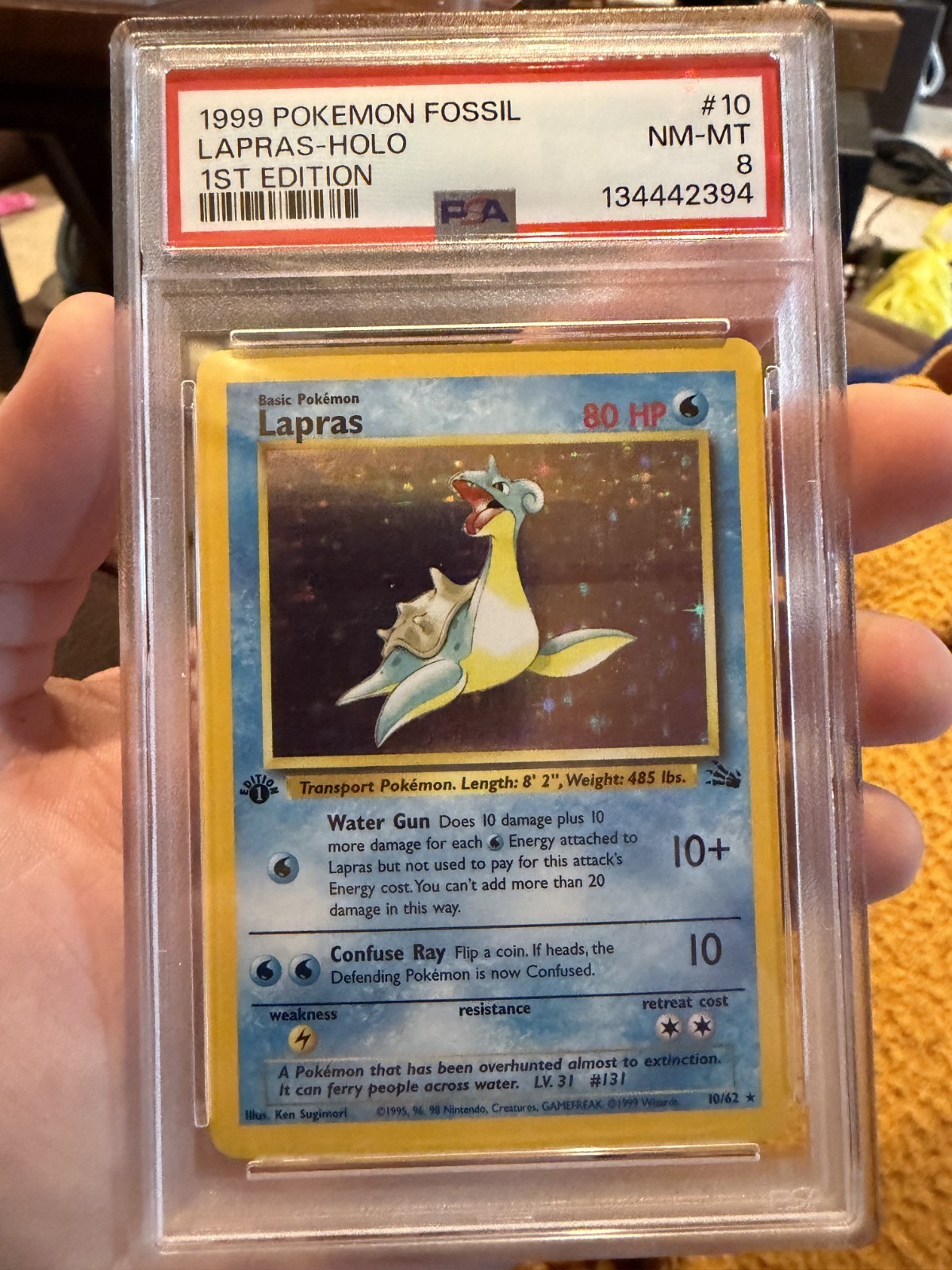 1999 Pokemon Fossil Lapras Holo 1st Edition #10/62 PSA 8 NM - MT
