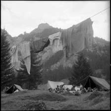 Hanging laundry in boy scouts camp in Kandersteg 1950 Switzerland Old Photo