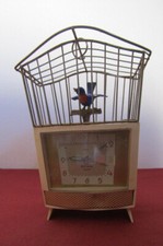 Antiguo reloj mecánico despertador alemán con rara alarma con canto de pájaro