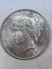 Lot 20:  1922-P $1 Peace Dollar. 90% Silver.