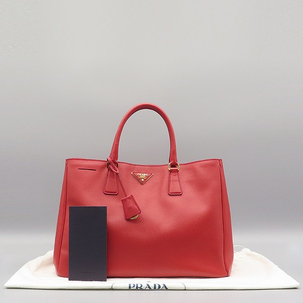 Prada Saffiano Lux red tote with gold triangle logo BN1844