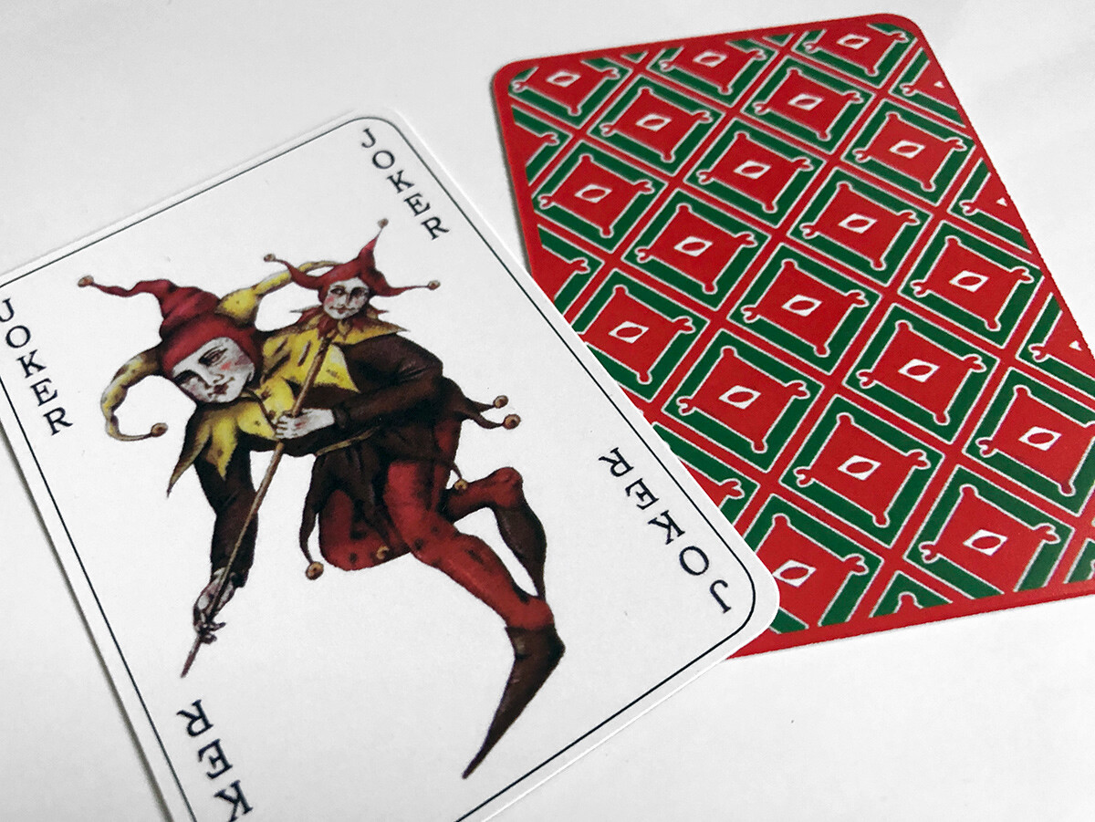 Joker calling card in evidence bag from Batman Begins / The Dark
