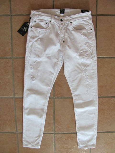 white slim tapered jeans