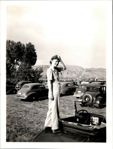 Woman standing on Antique Car, Parking lot, license plates, bandw Photograph eBay