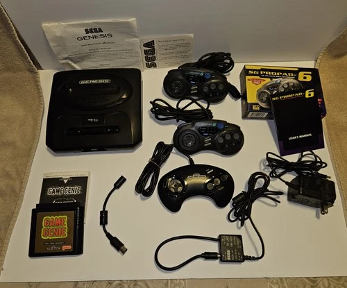 VINTAGE SEGA GENESIS MODEL 2.  + XTRAS CONTROLLERS,COMPLETE CABLES,POWER SUPPLY