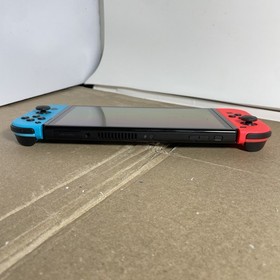 Nintendo Switch OLED HEG-001 Console with Red & Blue Joycons. Tested!