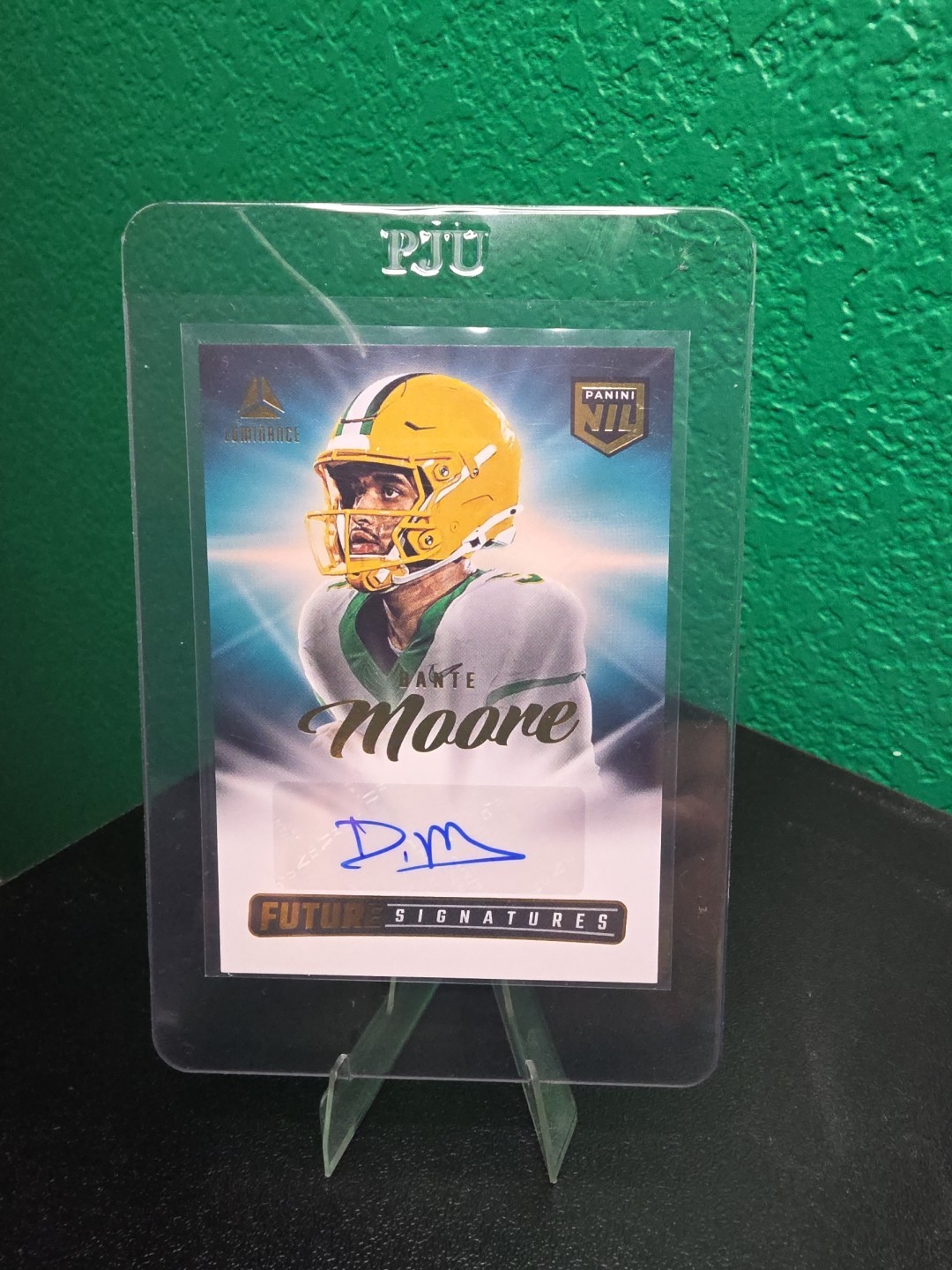 2025 Panini Luminance Dante Moore NIL Future Signatures Auto #NIL-DME
