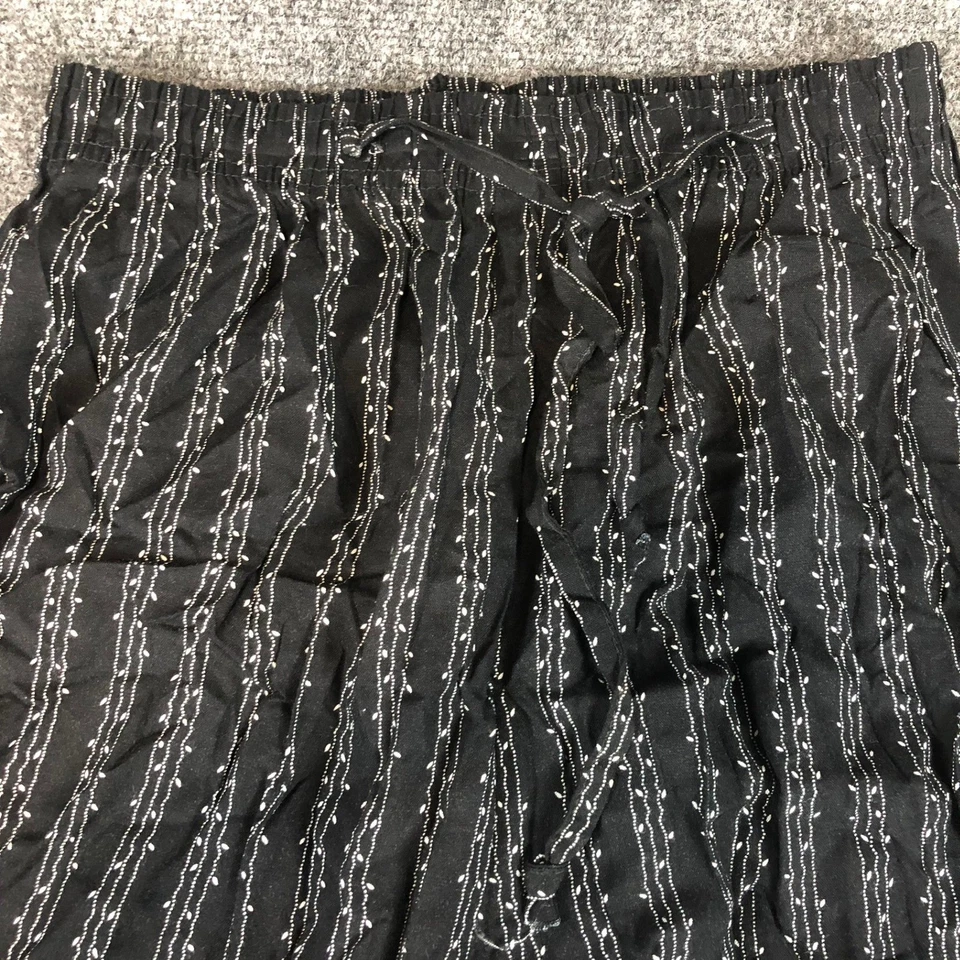 Calça lounge feminina Basic Editions listrada preta branca perna larga tamanho P - Imagem 2 de 4