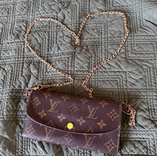 Portafoglio lungo marrone monogramma Louis Vuitton Emilie giallo fluo