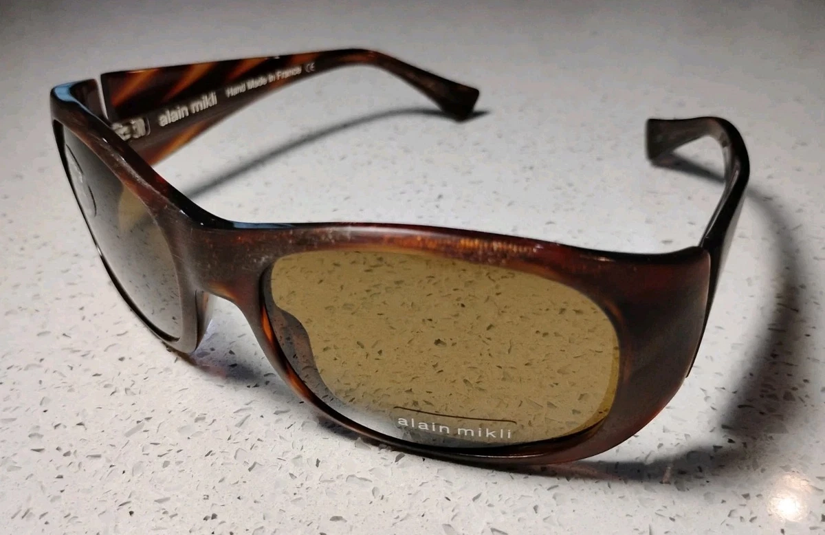 Alain Mikli Brown Oval Sunglasses for Women for sale | eBay display picture 3