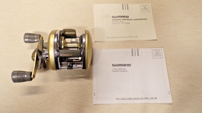 SHIMANO FISHING REEL - SHIMANO CALYX CYX-200 - CLEAN & WORKS GREAT