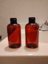 2 oz Plastic Amber Bottles With Disc Caps - 75 count