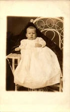 Vintage RPPC photo postcard Seated Baby AZO 1910s