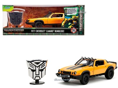 1977 CHEVROLET CAMARO OFF-ROAD YELLOW & TRANSFORMERS STATUE 1/24 BY JADA 34263