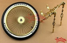 VINTAGE LOWRIDER 20" CAGE FLAT TWISTED GOLD CONTINENTAL KIT W/ LOWRIDER TIRE.