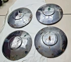 RENAULT JUVAQUATRE DAUPHINOISE SET OF FOUR HUBCAPS