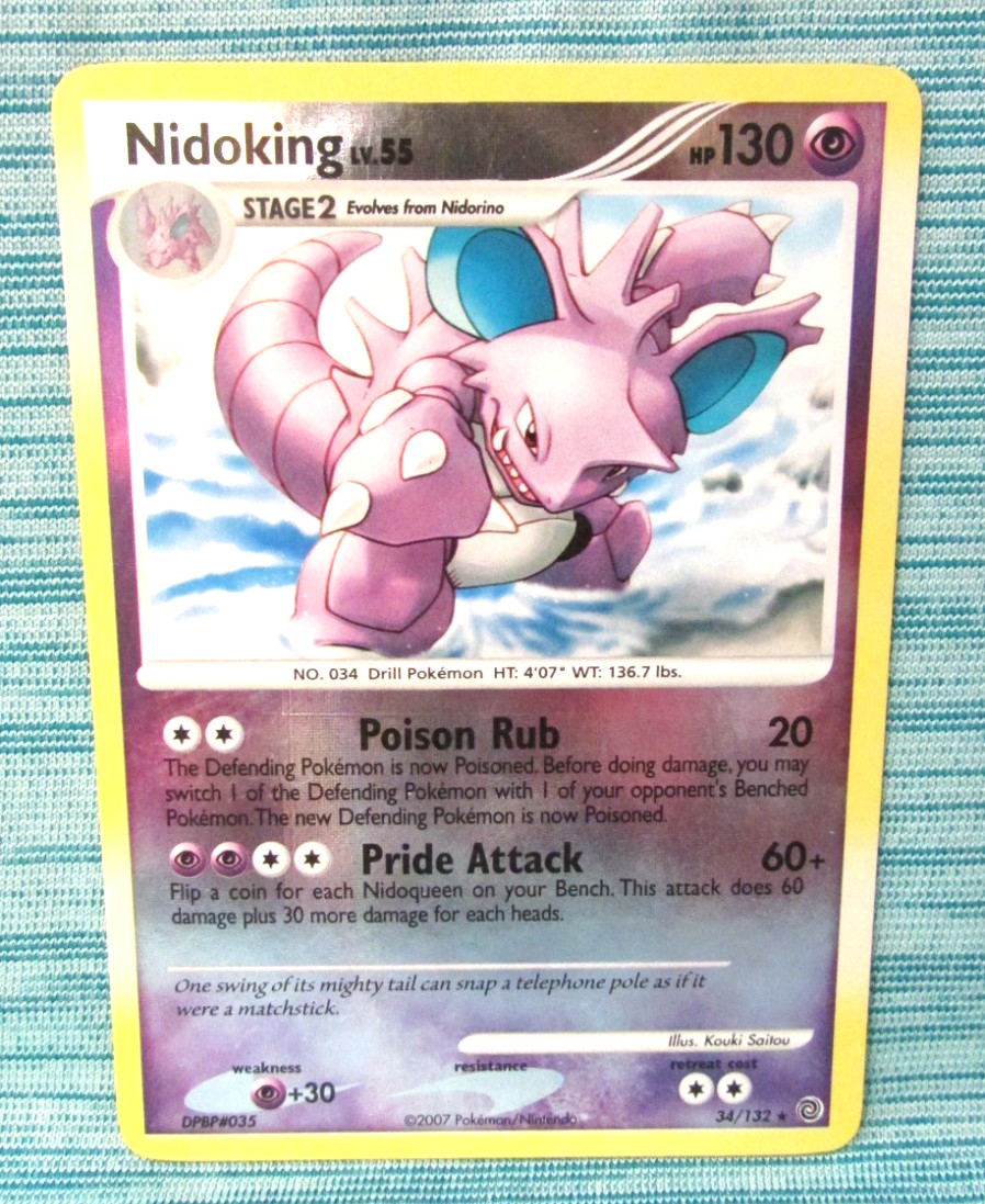 Nidoking Reverse Holo Secret Wonders 34/132 few scuffs on back