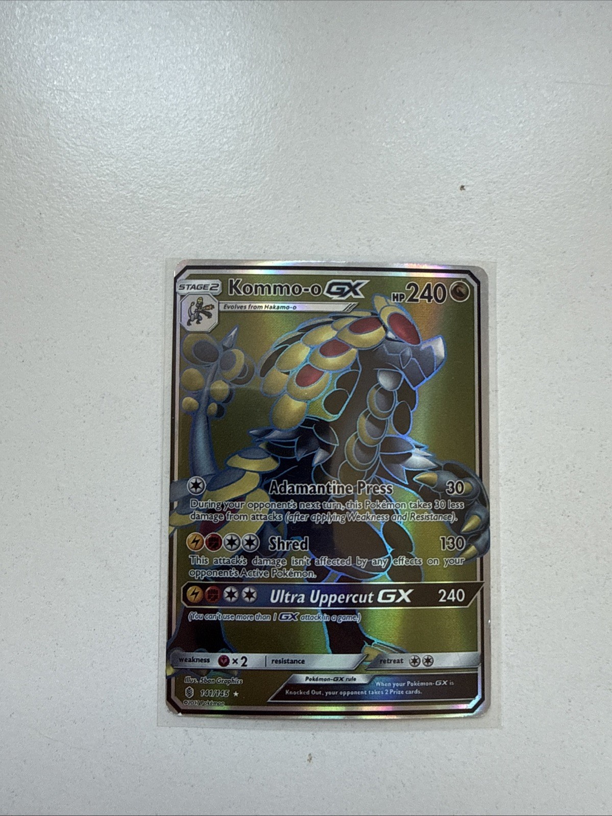 kommo-o gx pokemon card value Kommo-o GX (100/145) [Sun & Moon: Guardians Rising] – TokenMTG main image 0