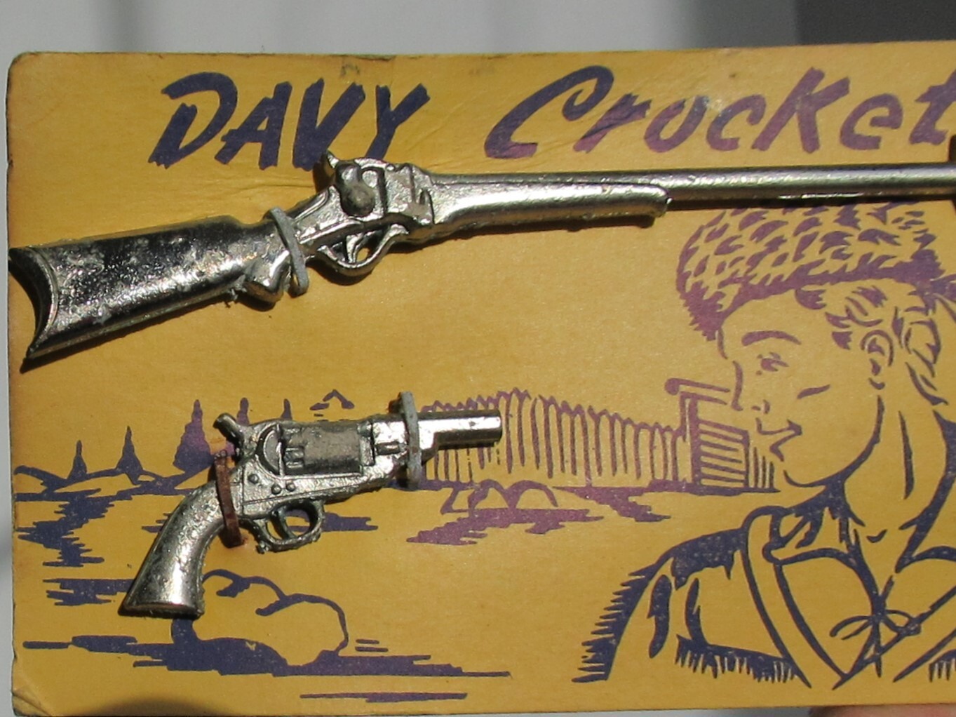 VINTAGE DAVY CROCKETT SMALL TOY METAL GUN RIFLE ON ORIGINAL CARD MARKED