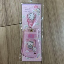 Dije de teléfono Hello Kitty rosa abatible, sin abrir, serie Angel, raro