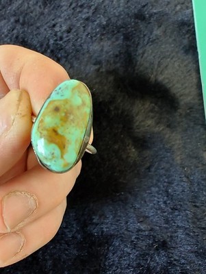 Unique Turquoise piece with oval shape sterling setting size 8 ring