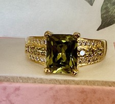 PERIDOT RING - 9X7mm Or 2.5ctw - PERIDOT  CLEAR ACCENTS - .925 SS/YELLOW GP  