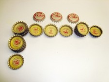 Unused Coca-Cola Tour The World Bottle Caps, 90 thru 99, 23 In All