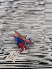 TIN PLATE LOOPING PLANE CLOCKWORK MECHANICAL WIND UP BI-PLANE