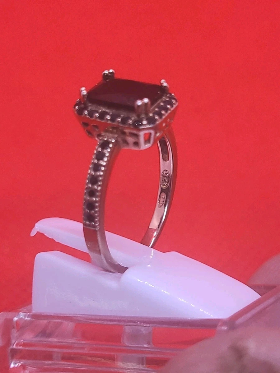 Bague argent travaillé et pierre Grenat facettée ovale