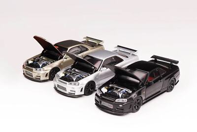 NISSAN SKYLINE GT-R (R34) プラモデル Amazon.com: Tamiya Nissan Skyline GT-R R34 V-Spec II 1/24