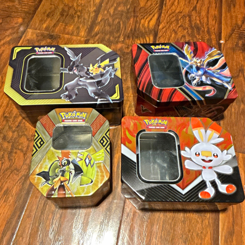 Pokémon TCG Lot of 4 Tin Cases: 1 Medium, 3 Large. *No Cards*. Good Condition
