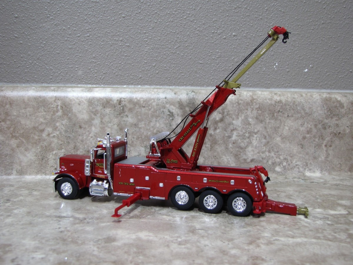 DCP 1/64 Red Tri-State 389 Peterbilt Rotator Wrecker Semi Truck